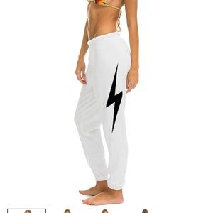 Aviator Nation White Joggers with Black Lightning Bolt